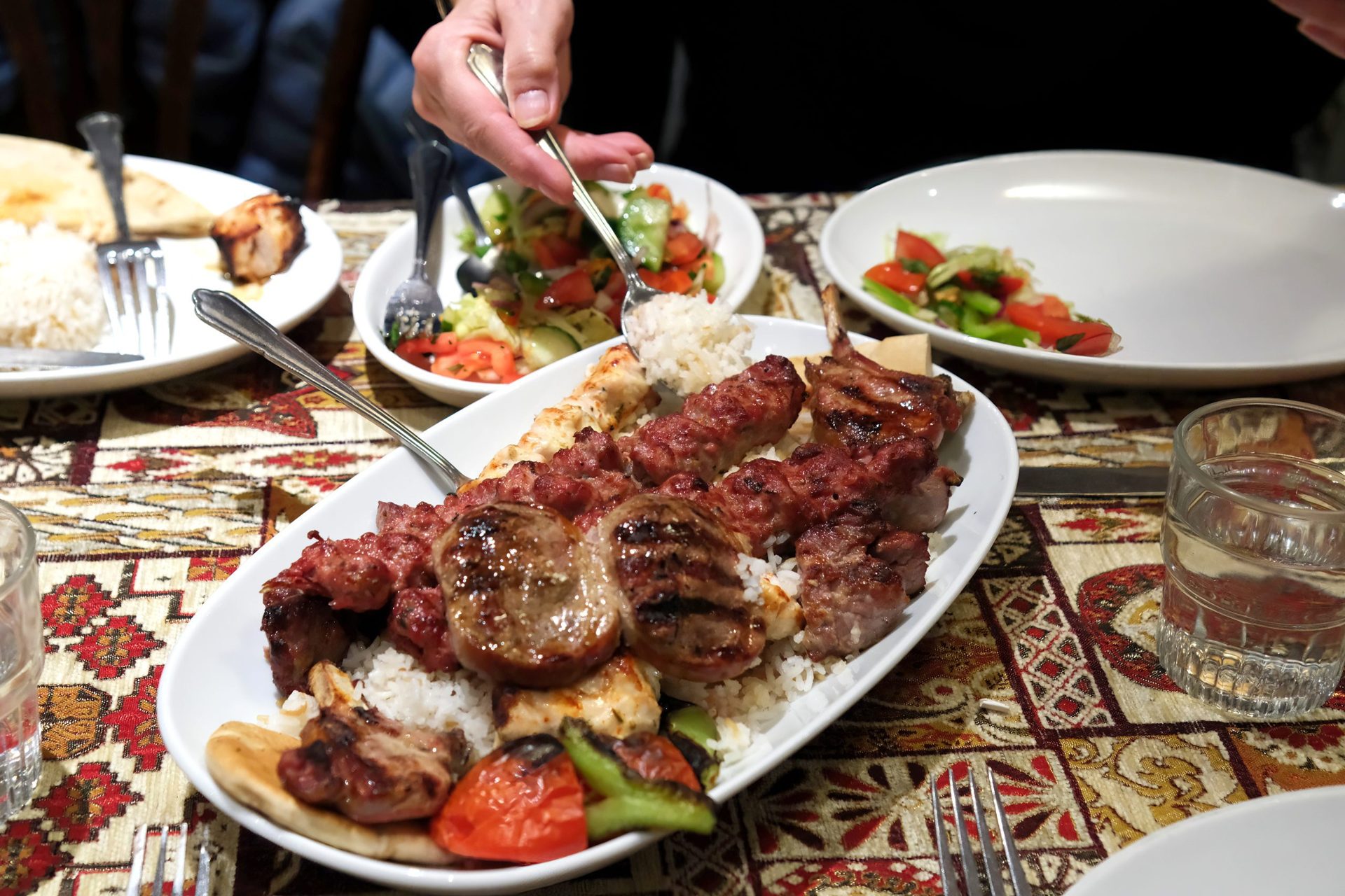 Mixed grill with rice and salad